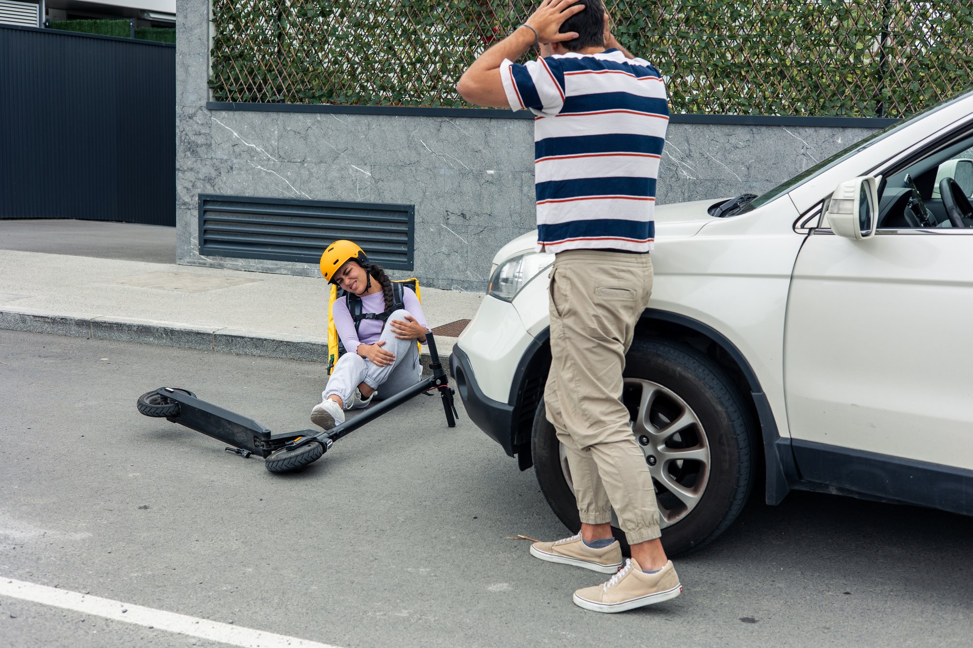 driver-holding-head-in-distress-after-hitting-lati-2025-04-10-11-18-43-utc